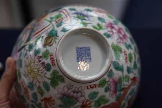 A Chinese famille rose dragon and phoenix bowl, Jiaqing seal mark, late 19th / early 20th century, diam. 21cm, broken and repaired